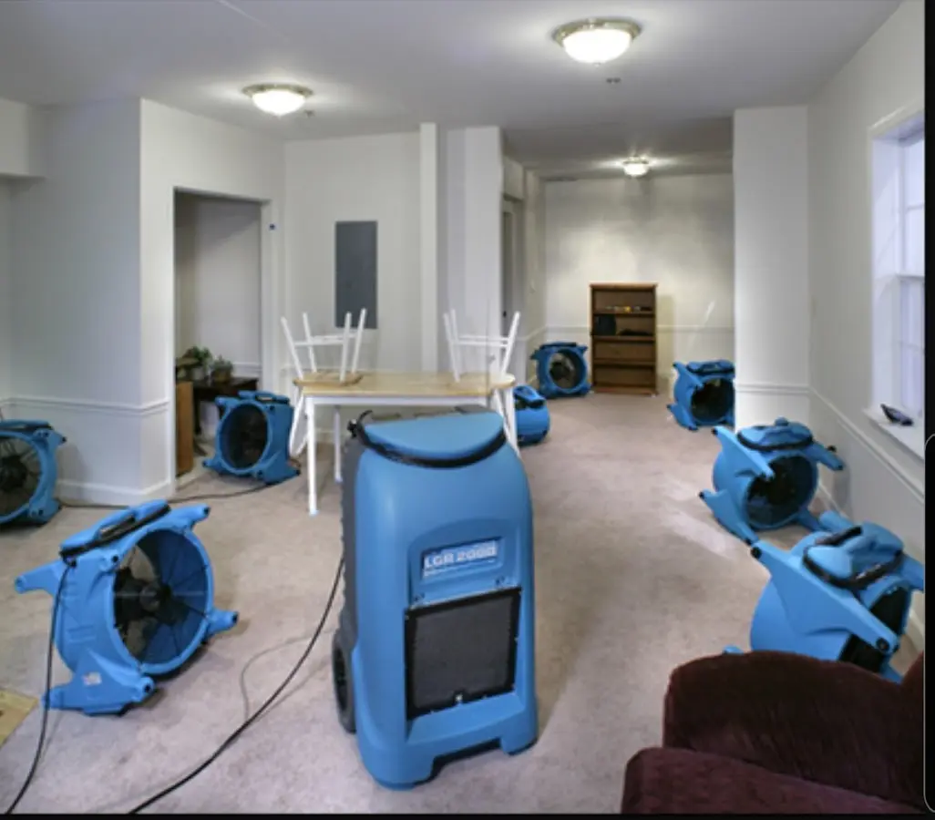 Air movers and dehumidifier setup for Water Extraction & Removal in Latimer